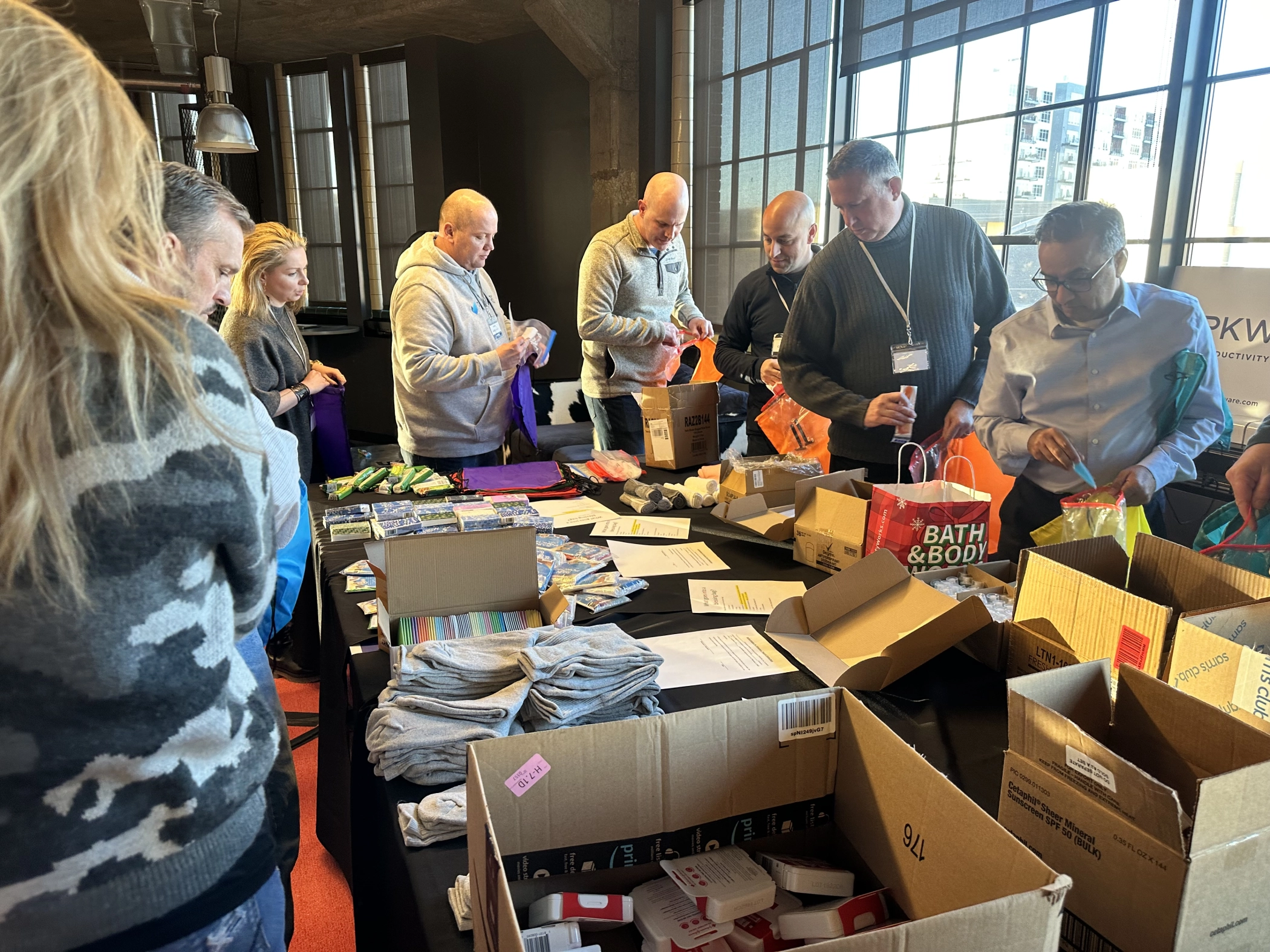 PKWARE employees packing donations at a PK Cares event